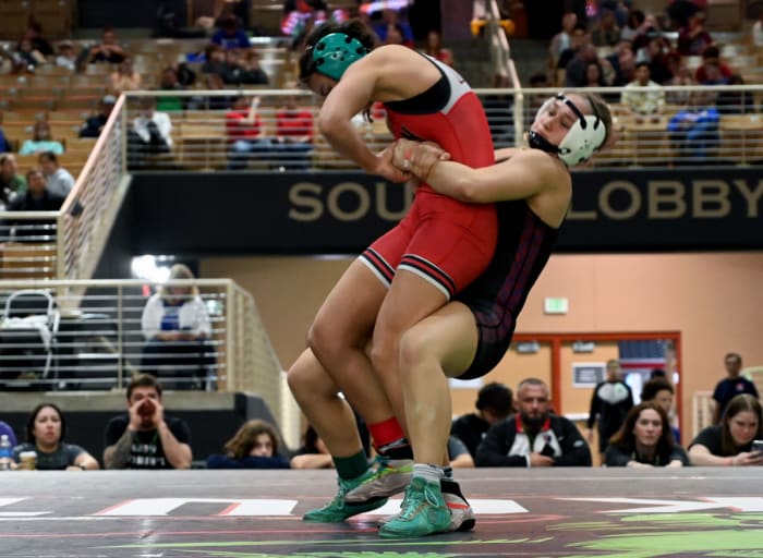Marigona Lau wins the 130-pound championship against Julianna Caisee from Palm Harbor Hurricane at the Knockout Christmas Classic at Silver Spurs Arena in Kissimmee on Thursday.